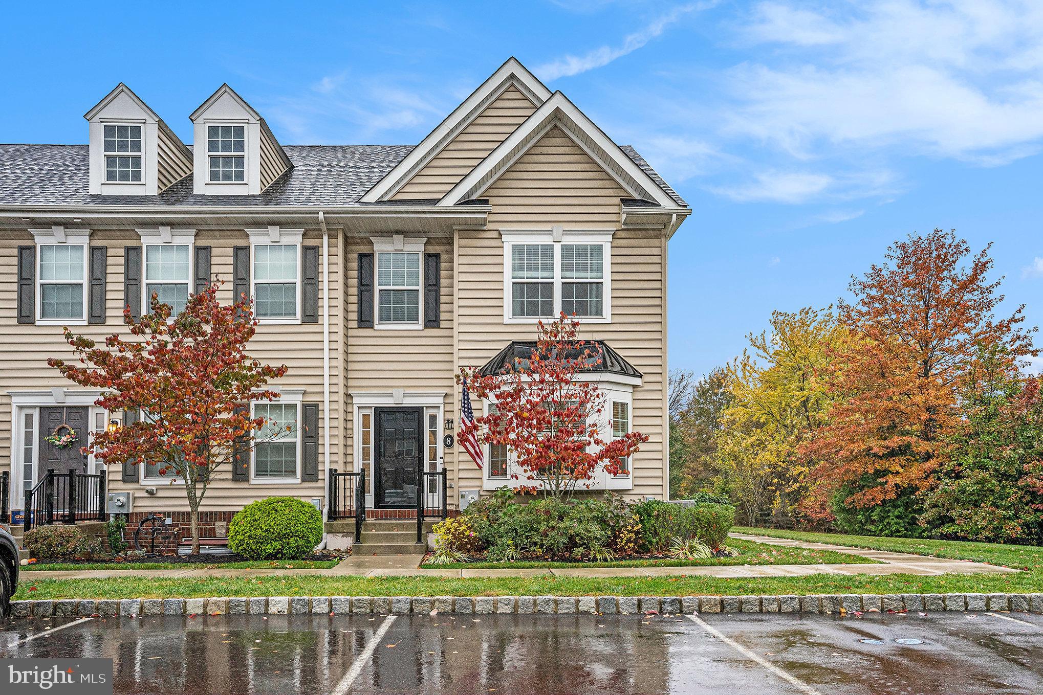 3611 Jacob Stout Road, Unit 8 Doylestown, PA 18902 - Photo 2 of 39 a front view of a house with garden