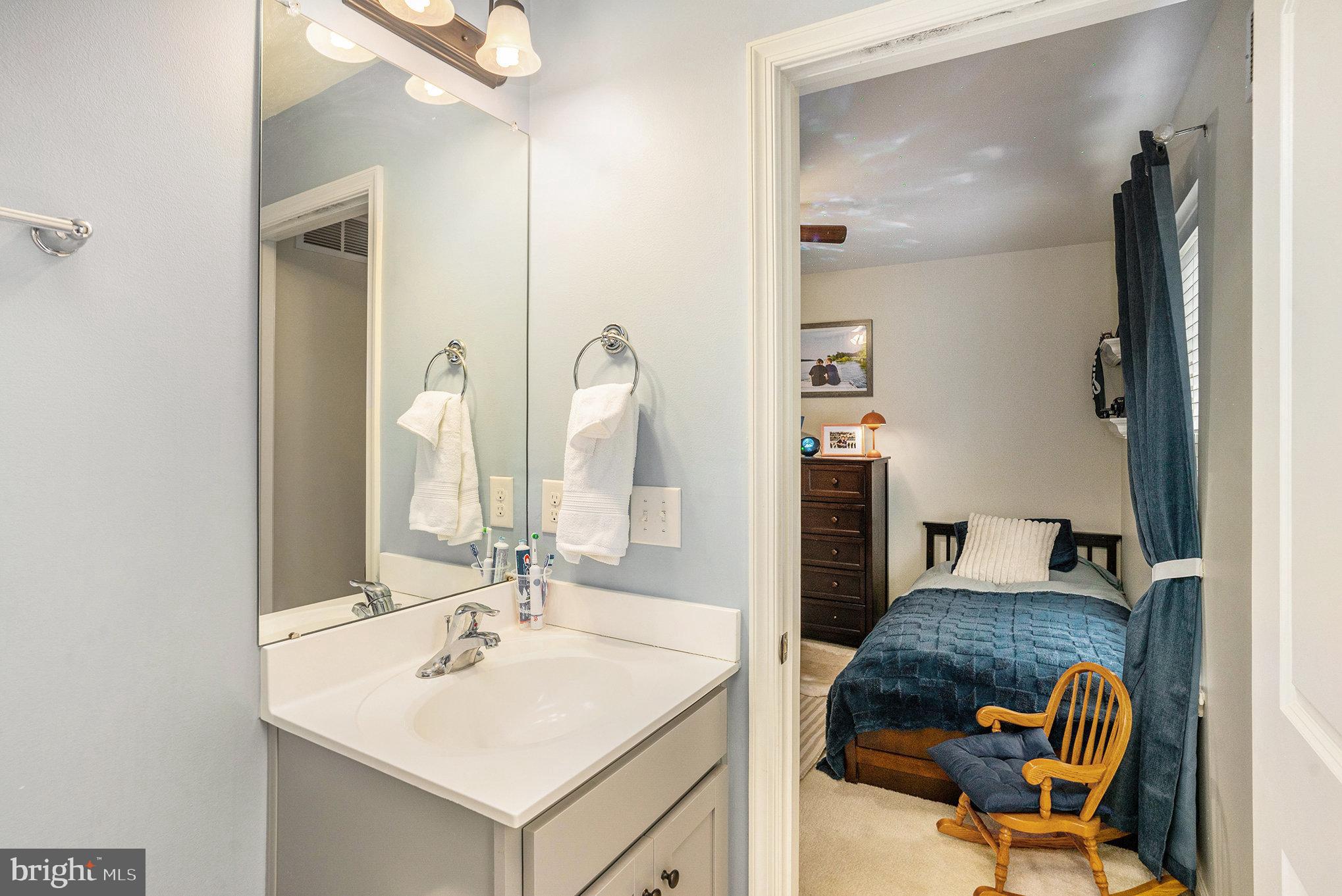 3611 Jacob Stout Road, Unit 8 Doylestown, PA 18902 - Photo 25 of 39 a bathroom with a sink and a mirror