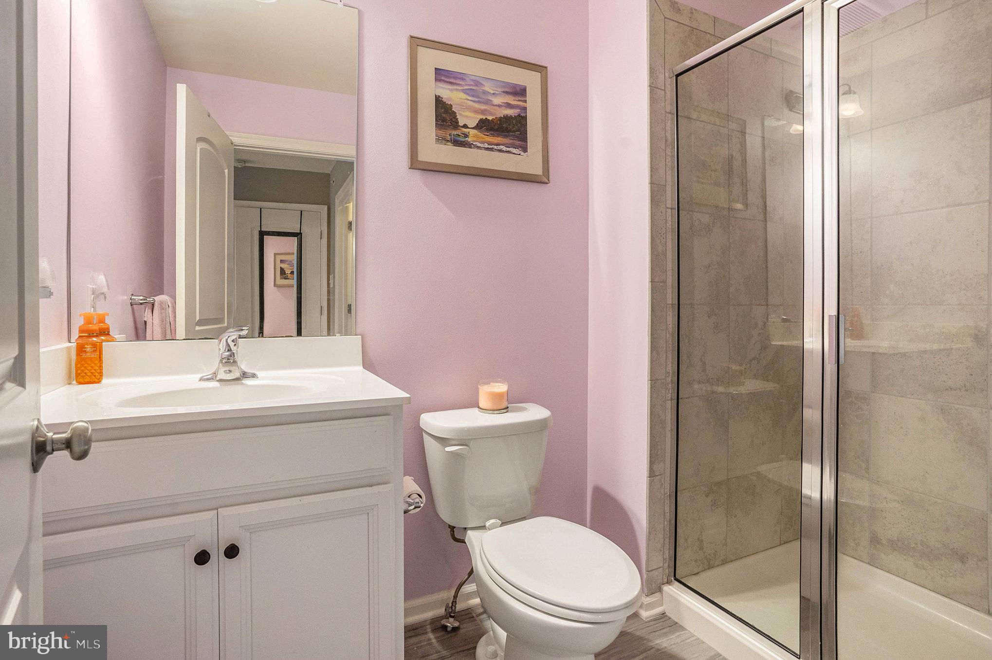 3611 Jacob Stout Road, Unit 8 Doylestown, PA 18902 - Photo 30 of 39 a bathroom with a sink toilet and shower
