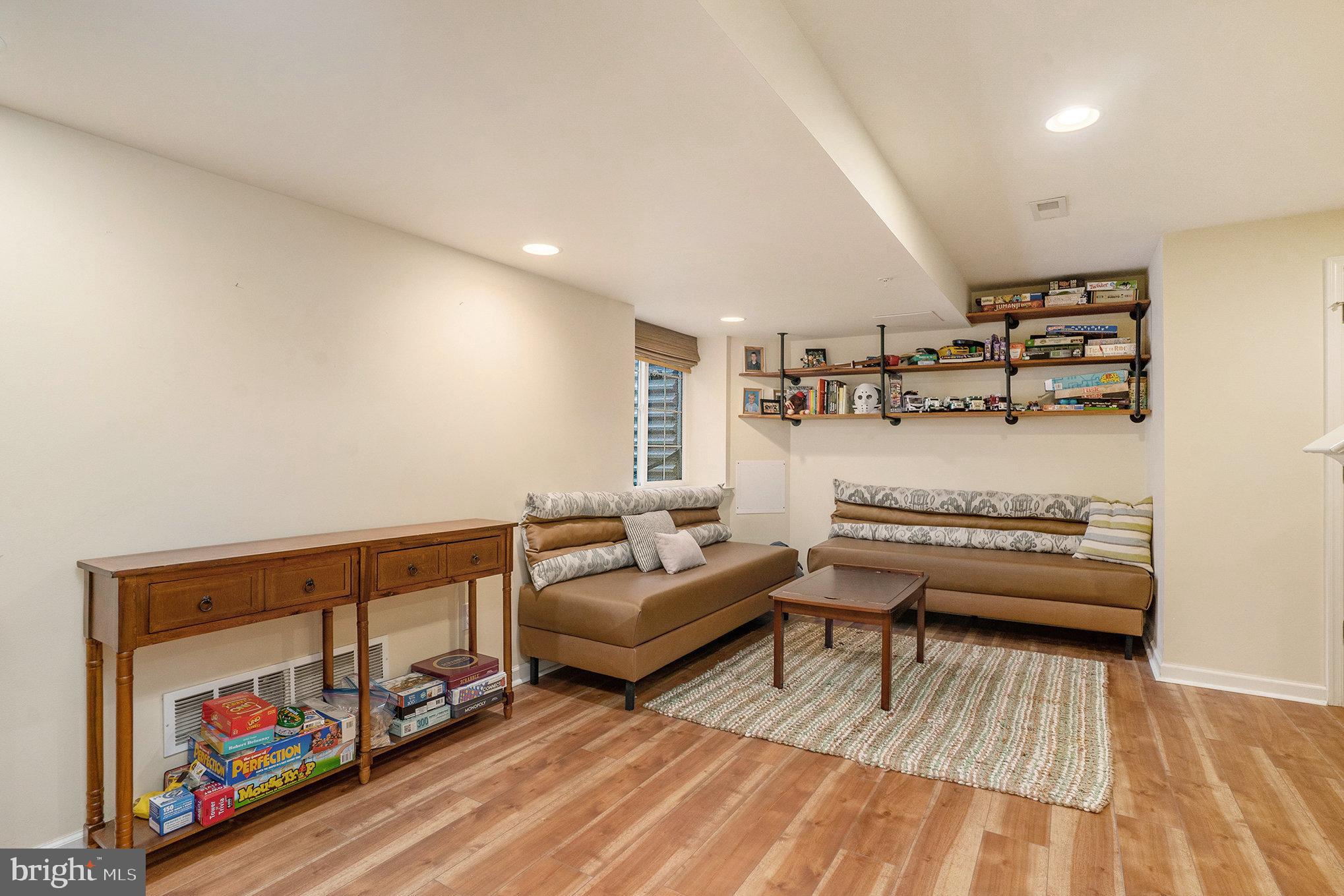 3611 Jacob Stout Road, Unit 8 Doylestown, PA 18902 - Photo 32 of 39 a living room with furniture and wooden floor