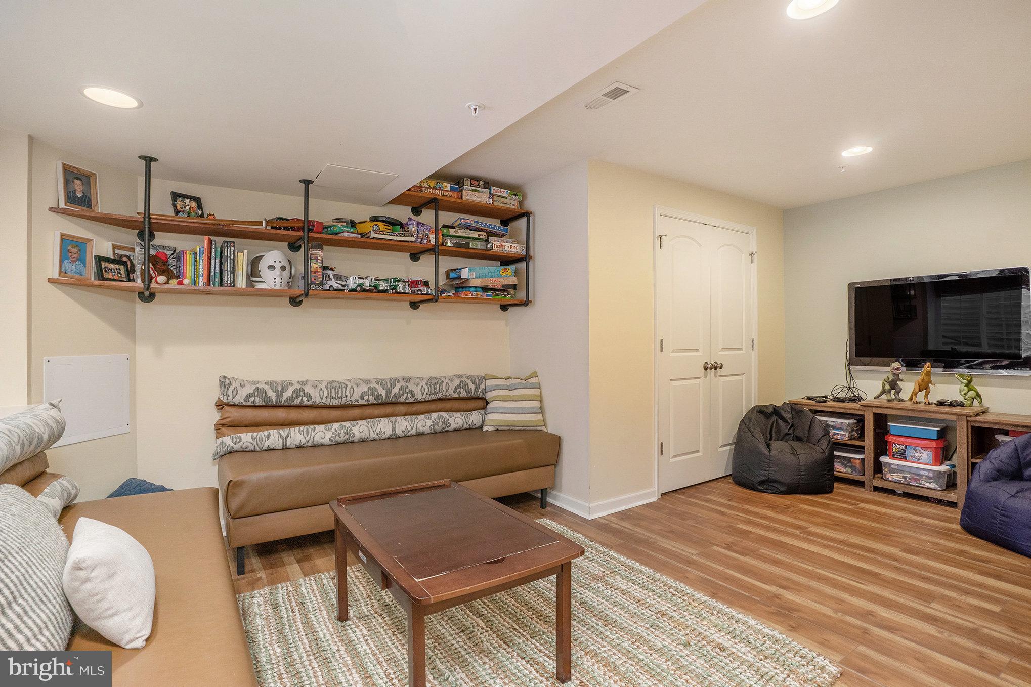 3611 Jacob Stout Road, Unit 8 Doylestown, PA 18902 - Photo 34 of 39 a bedroom with furniture and a flat screen tv
