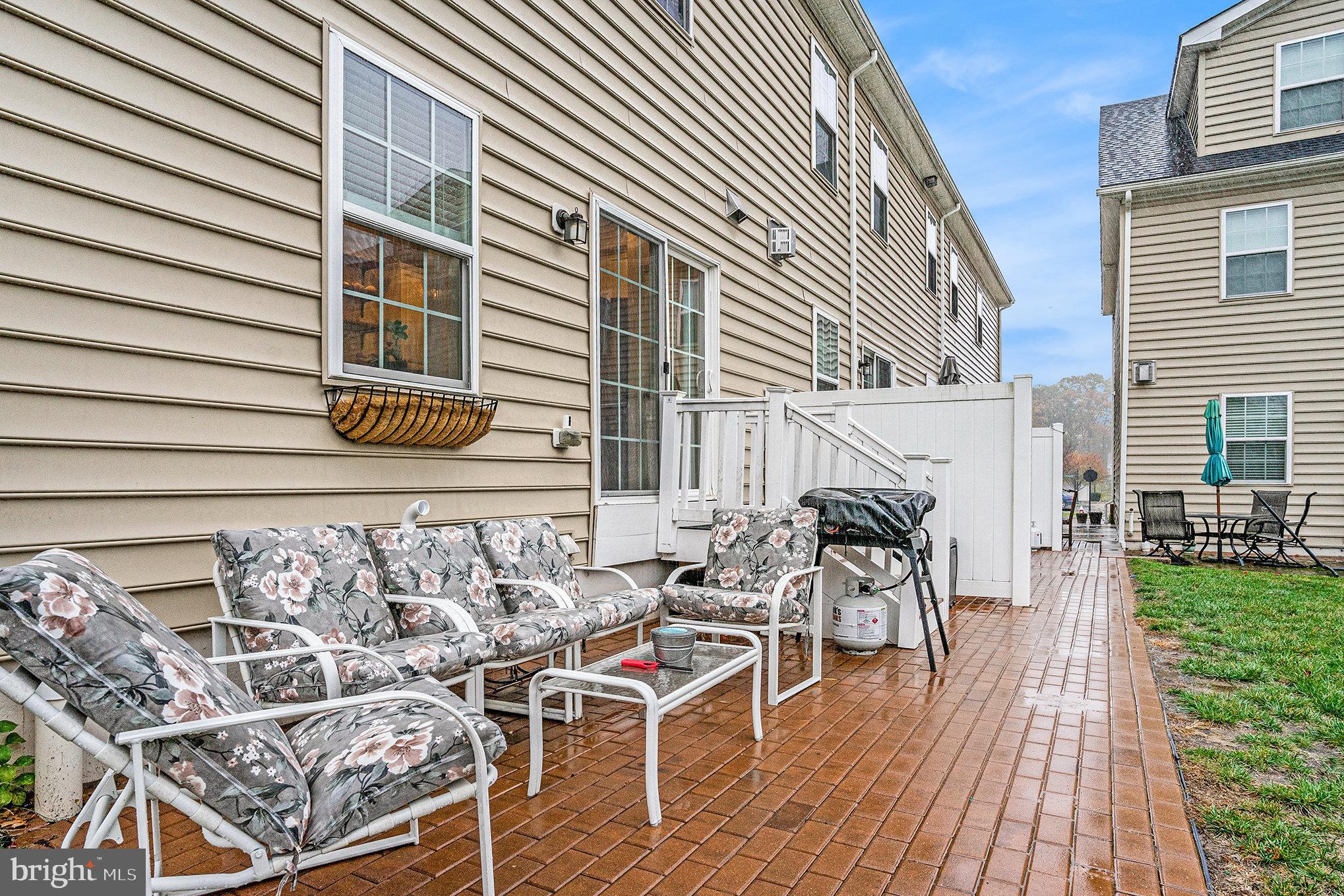 3611 Jacob Stout Road, Unit 8 Doylestown, PA 18902 - Photo 39 of 39 a view of a patio with table and chairs