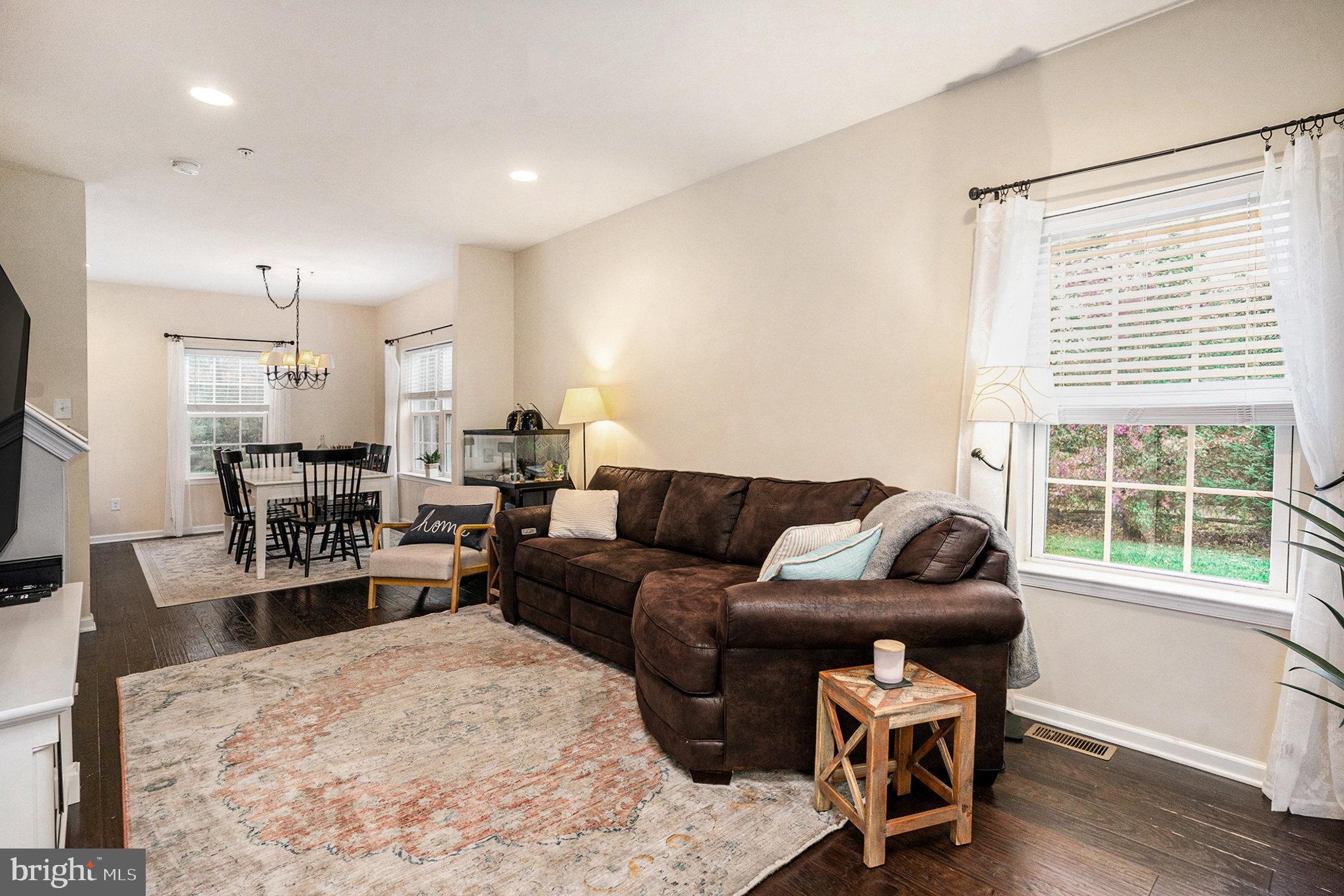 3611 Jacob Stout Road, Unit 8 Doylestown, PA 18902 - Photo 5 of 39 a living room with furniture and a large window