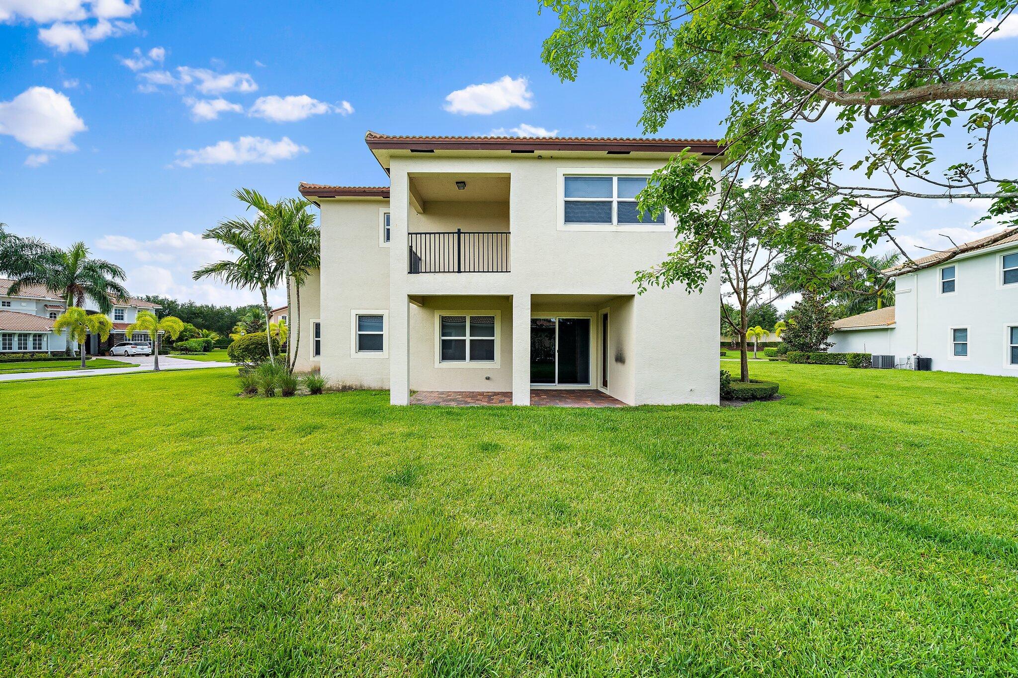 434 Rudder Cay Way Jupiter, FL 33458 - Photo 42 of 52 434 rudder cay 6-25 back yard to house 2