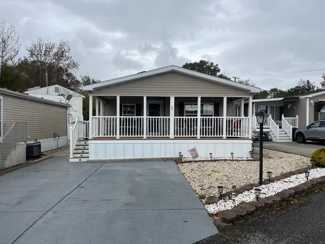 a house view with a garden space