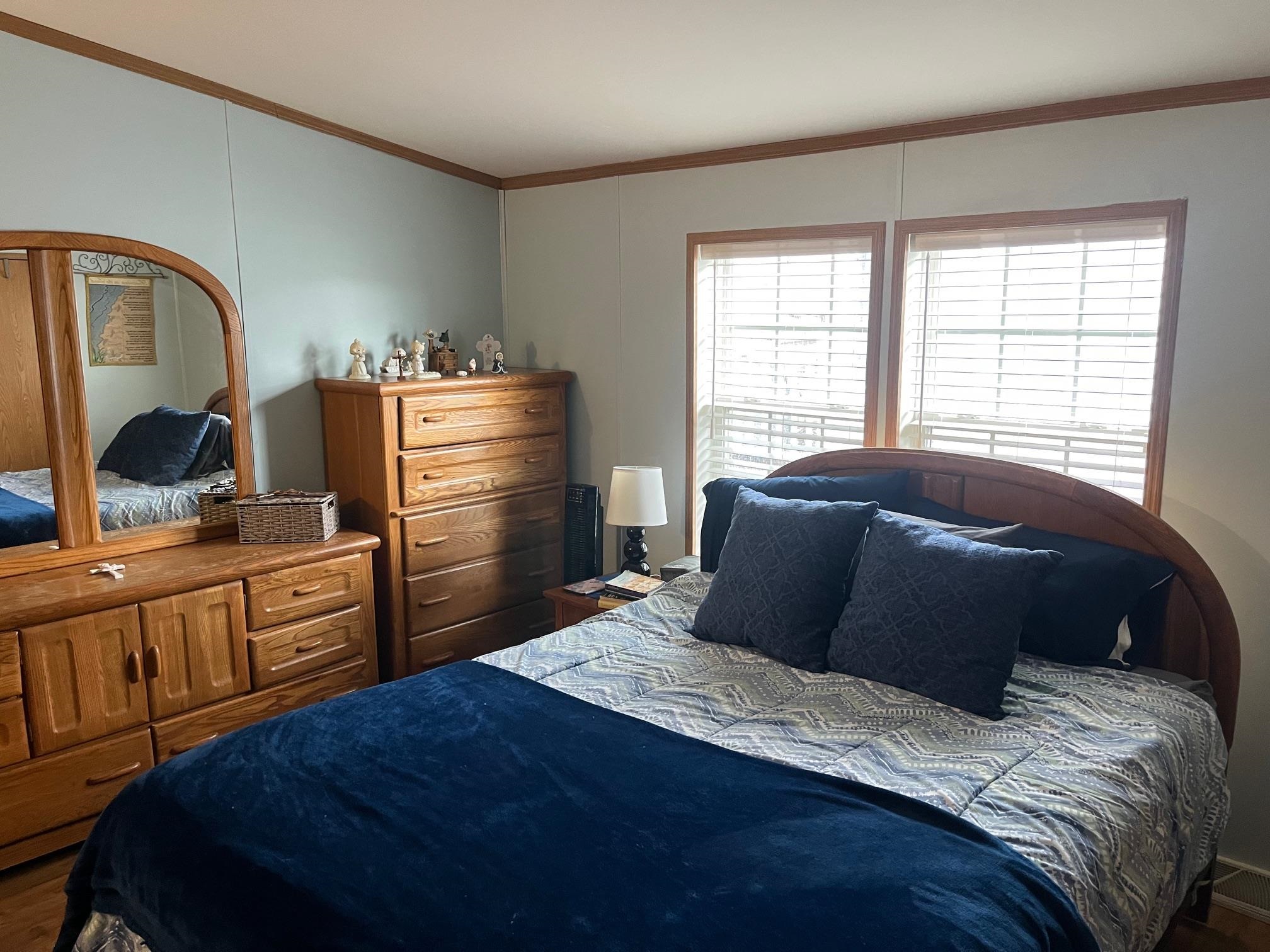 1402 South Rte 9 Cape May Court House, NJ 08210 - Photo 12 of 18 a bedroom with a bed and dresser with mirror
