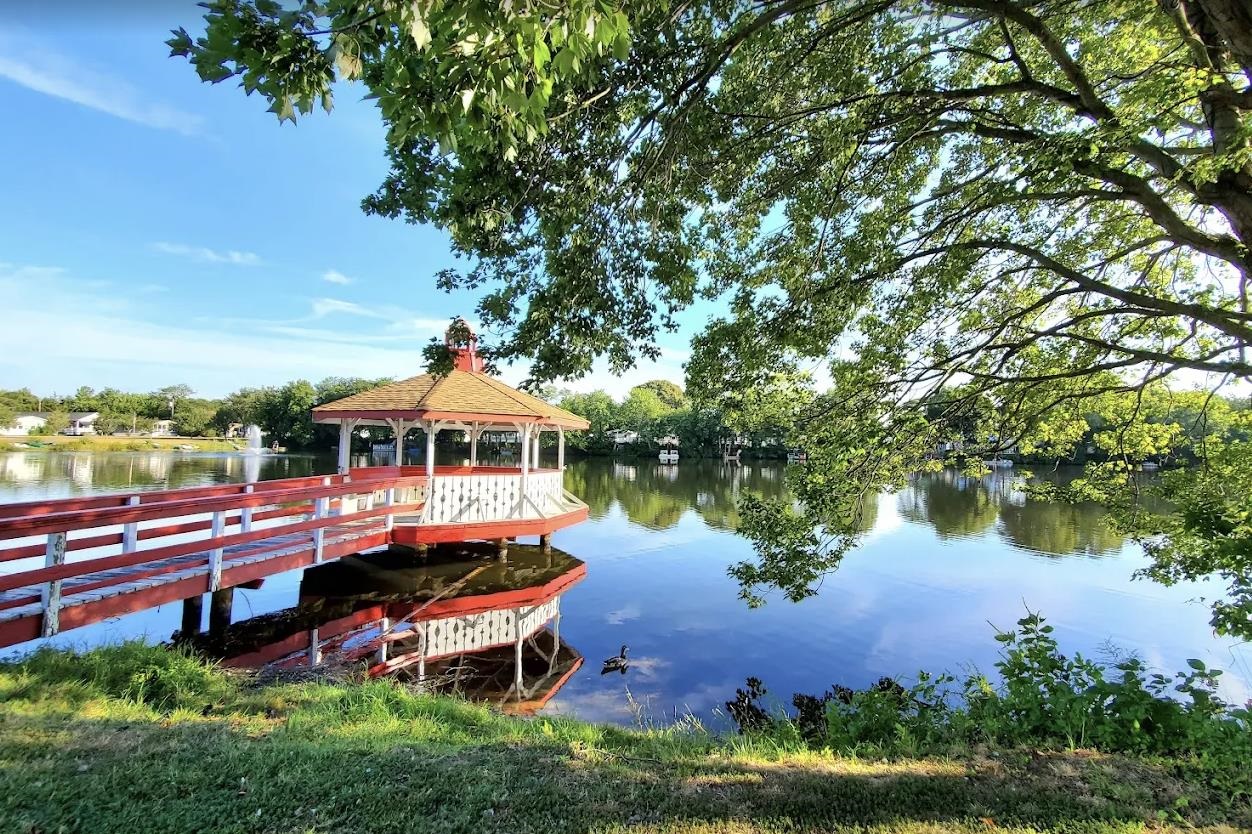 1402 South Rte 9 Cape May Court House, NJ 08210 - Photo 16 of 18 an aerial view of a house with outdoor space lake view and houses in the back