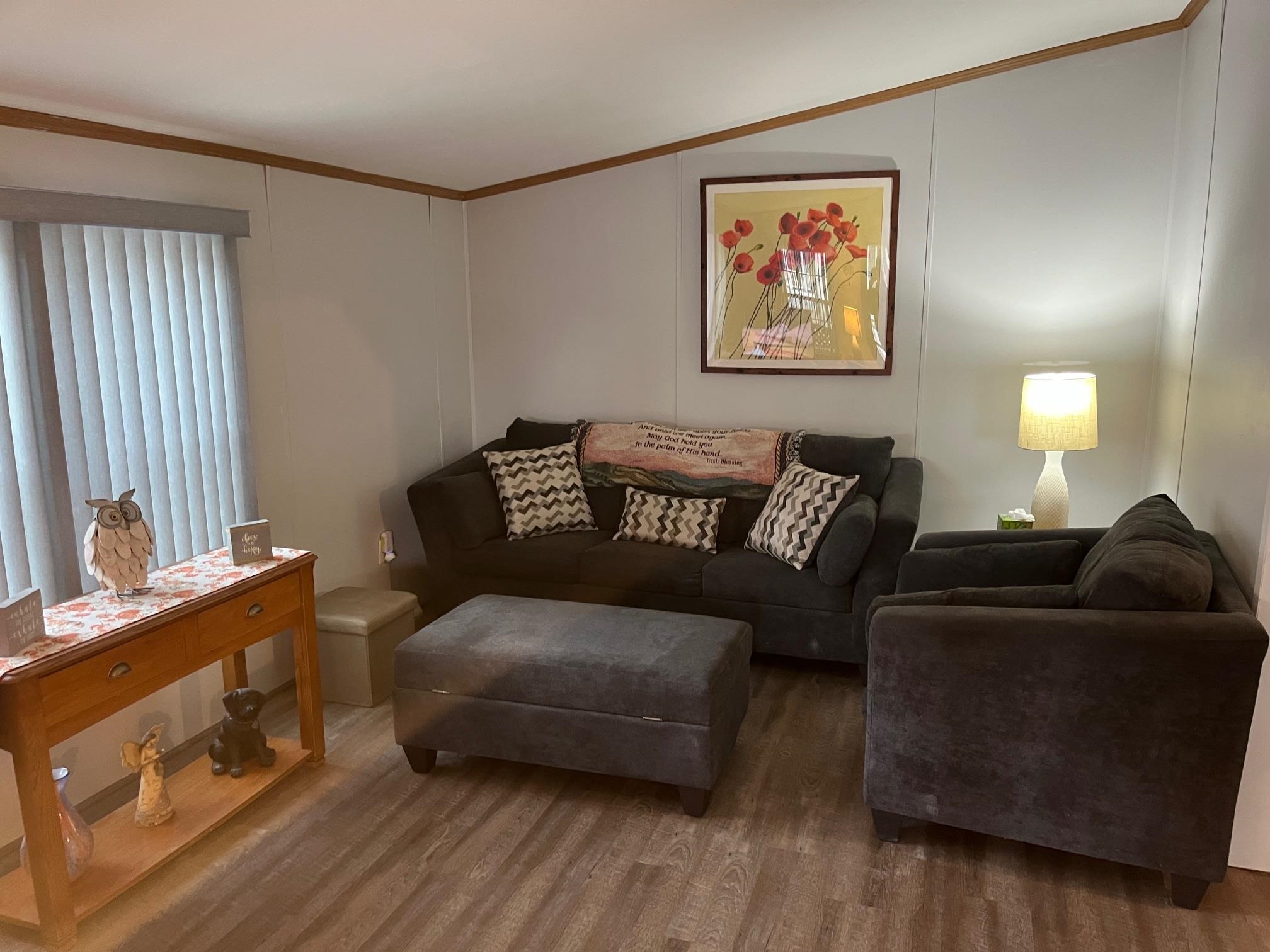 1402 South Rte 9 Cape May Court House, NJ 08210 - Photo 6 of 18 a living room with furniture and a flat screen tv