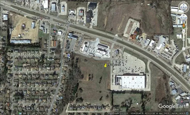 a large stone building with glass door