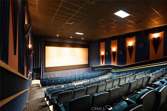 a view of a projector room with projector and furniture