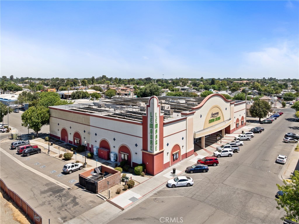 400 Follett Street Lemoore, CA 93245 - Photo 2 of 34 an aerial view of a city with streets and houses