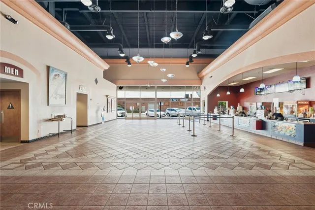 a view of a patio with a table and chairs