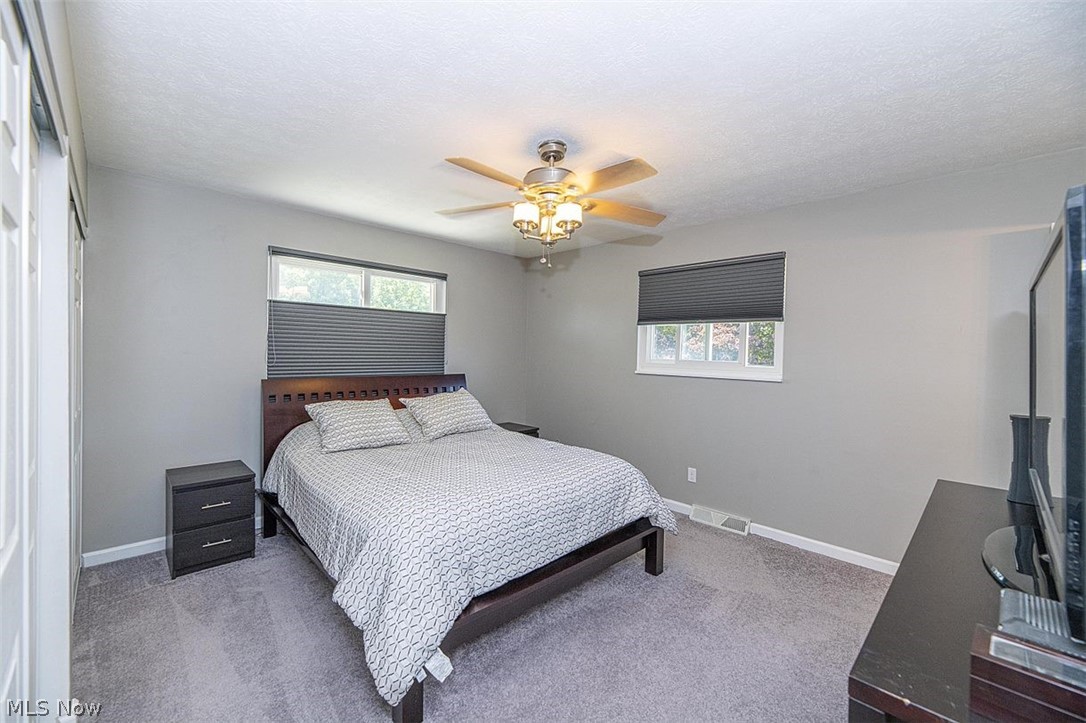1275 Long Ridge Drive Independence, OH 44131 - Photo 16 of 31 Relax in the expansive Master Bedroom featuring newer carpeting, updated ceiling fan and black-out shades.