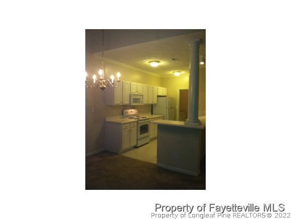 532-7 Lionshead Road Fayetteville, NC 28311 - Photo 8 of 21 a kitchen with a sink and cabinets