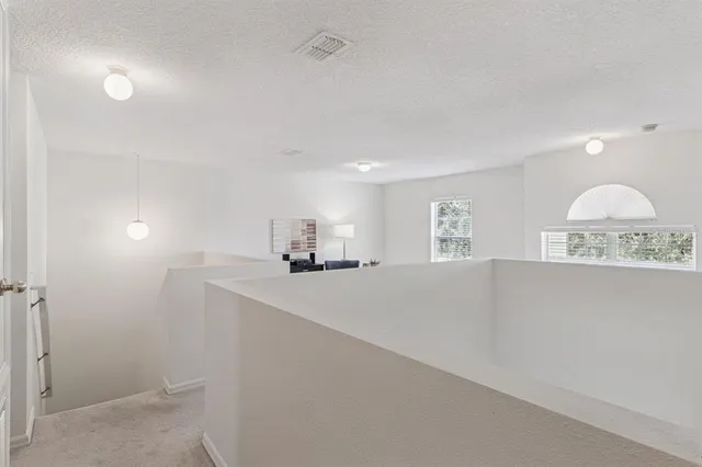 a view of a kitchen with a sink