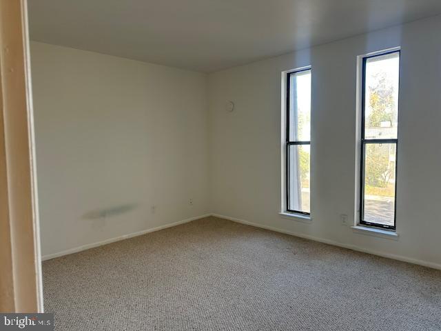 25 South Church Road, Unit 38 Maple Shade, NJ 08052 - Photo 18 of 20 an empty room with windows