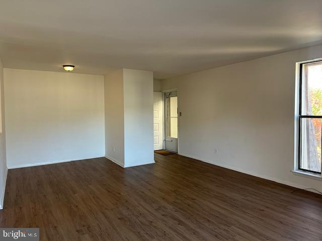 25 South Church Road, Unit 38 Maple Shade, NJ 08052 - Photo 5 of 20 an empty room with wooden floor and windows