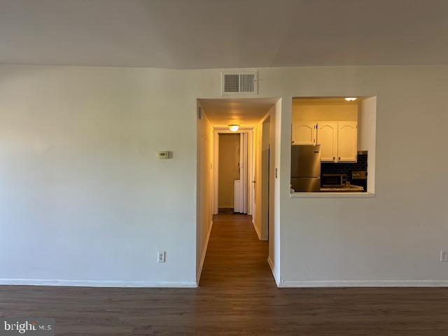 25 South Church Road, Unit 38 Maple Shade, NJ 08052 - Photo 7 of 20 a view of a hallway with wooden floor and closet