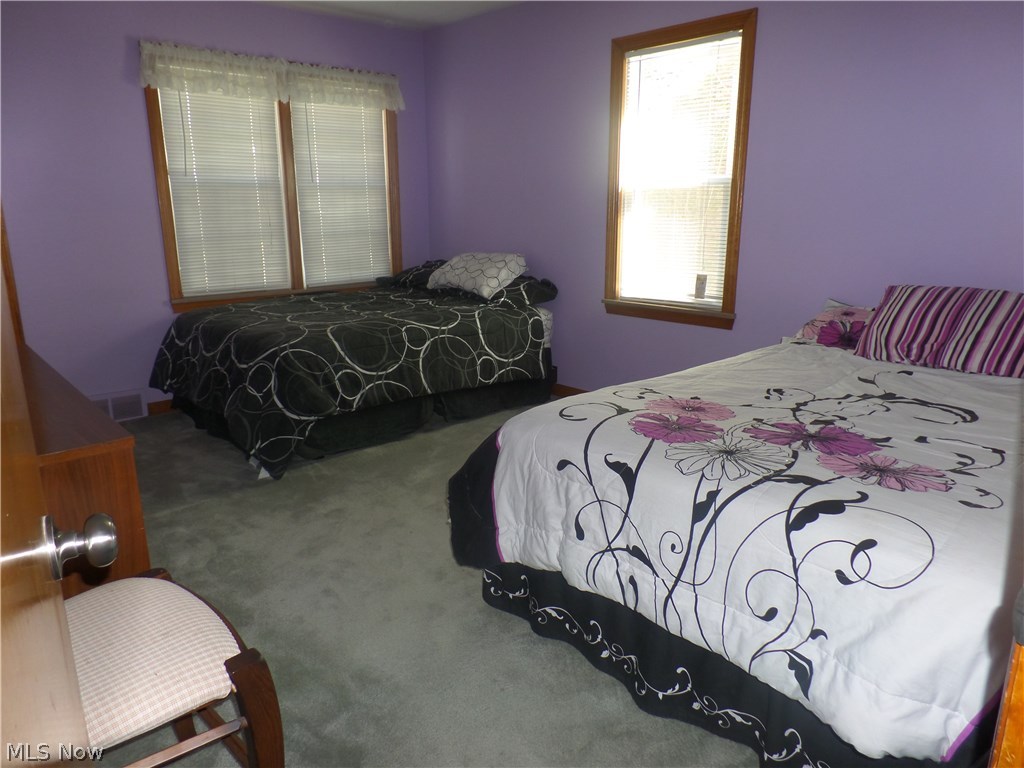 1566 Felton Road South Euclid, OH 44121 - Photo 10 of 21 The other large first floor bedroom. There is a lot of closet space in all of the bedrooms.