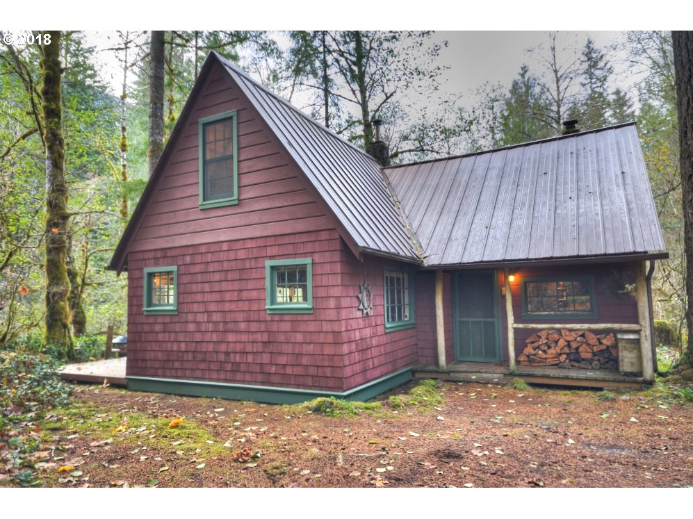 28387 Road 20, Unit 36 Rhododendron, OR 97049 - Photo 1 of 1 a view of a small house and a yard
