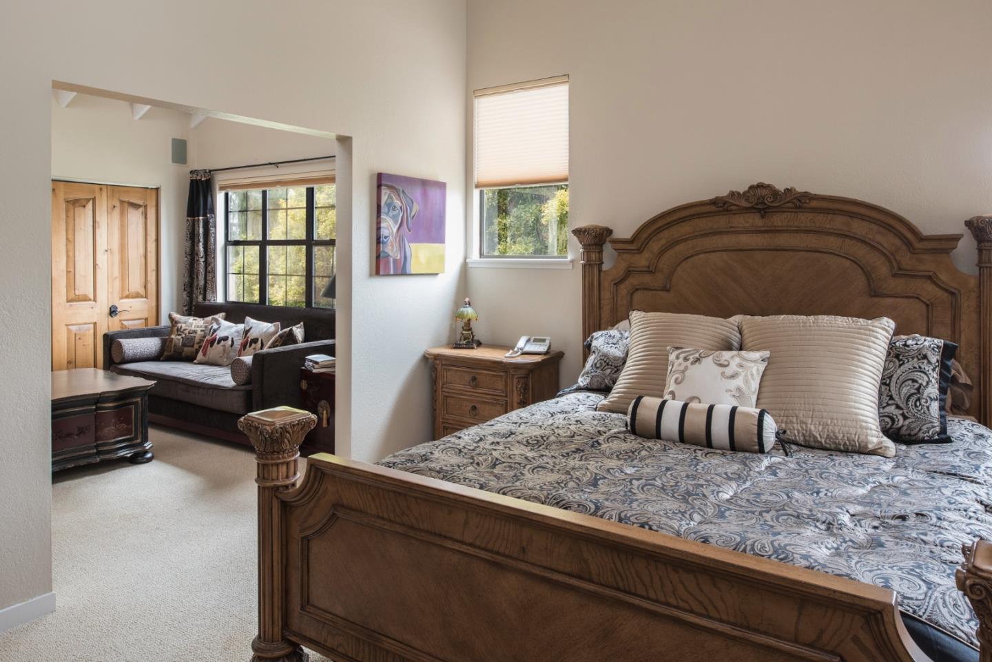 3025 Bird Rock Road Pebble Beach, CA 93953 - Photo 17 of 25 a bedroom with a bed and a couch
