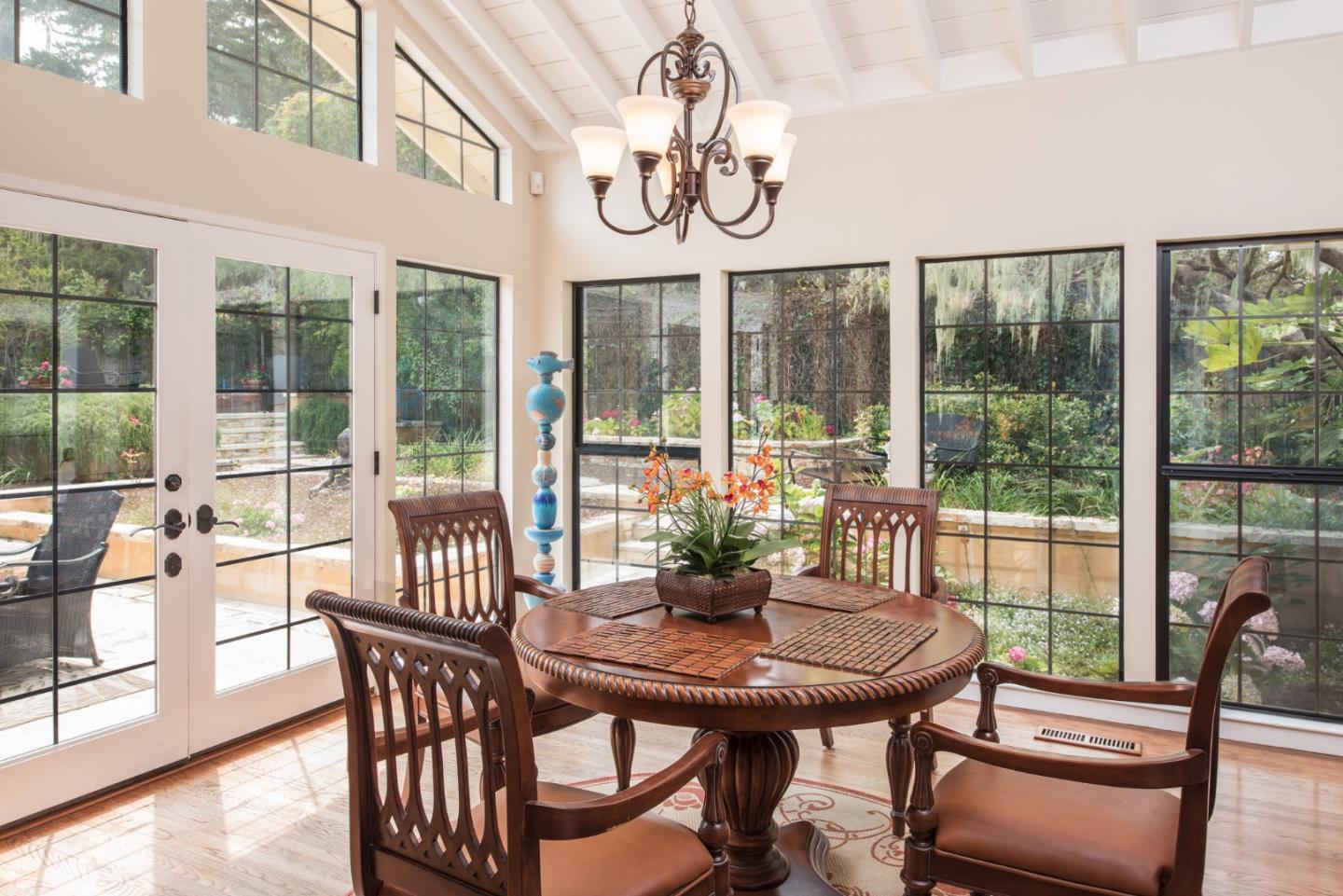 3025 Bird Rock Road Pebble Beach, CA 93953 - Photo 9 of 25 a view of a dining room with furniture window and outside view