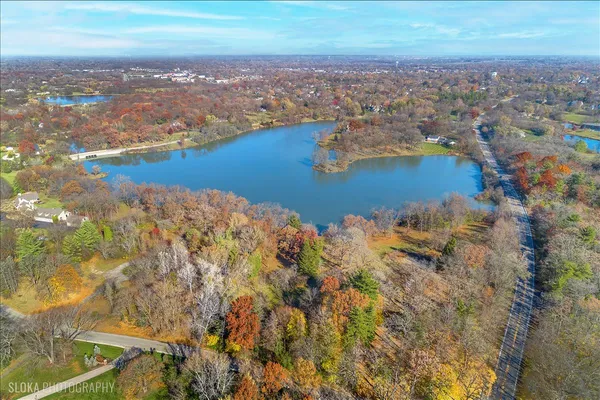 an aerial view of residential building with ocean view