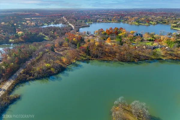 a view of a lake with a city