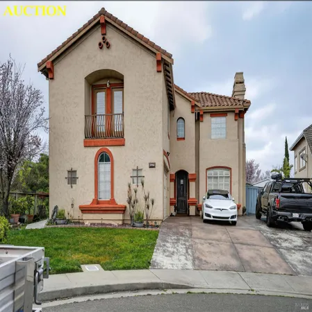 a car parked in front of a house