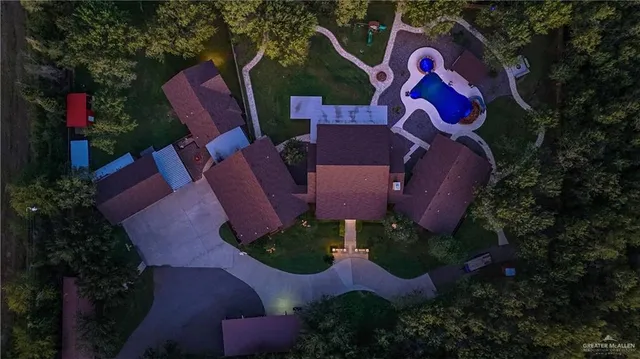 an aerial view of residential house with outdoor space and street view