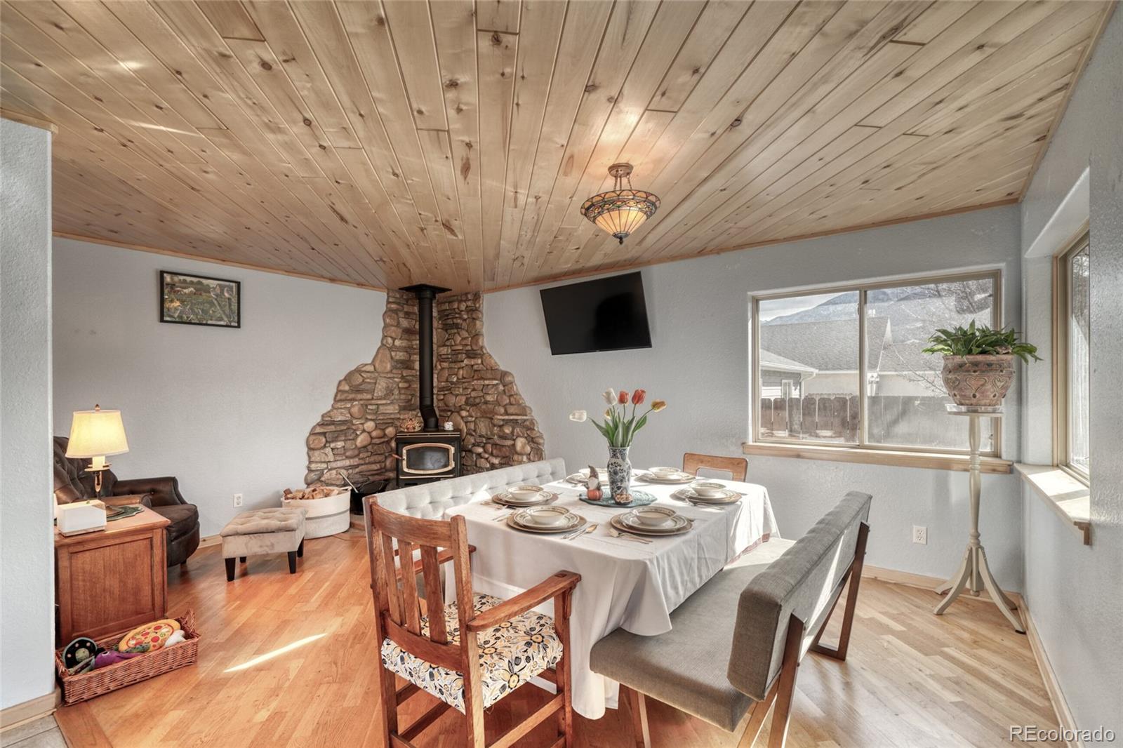 50 Rex Circle Salida, CO 81201 - Photo 26 of 50 a view of a dining room with furniture wooden floor and chandelier