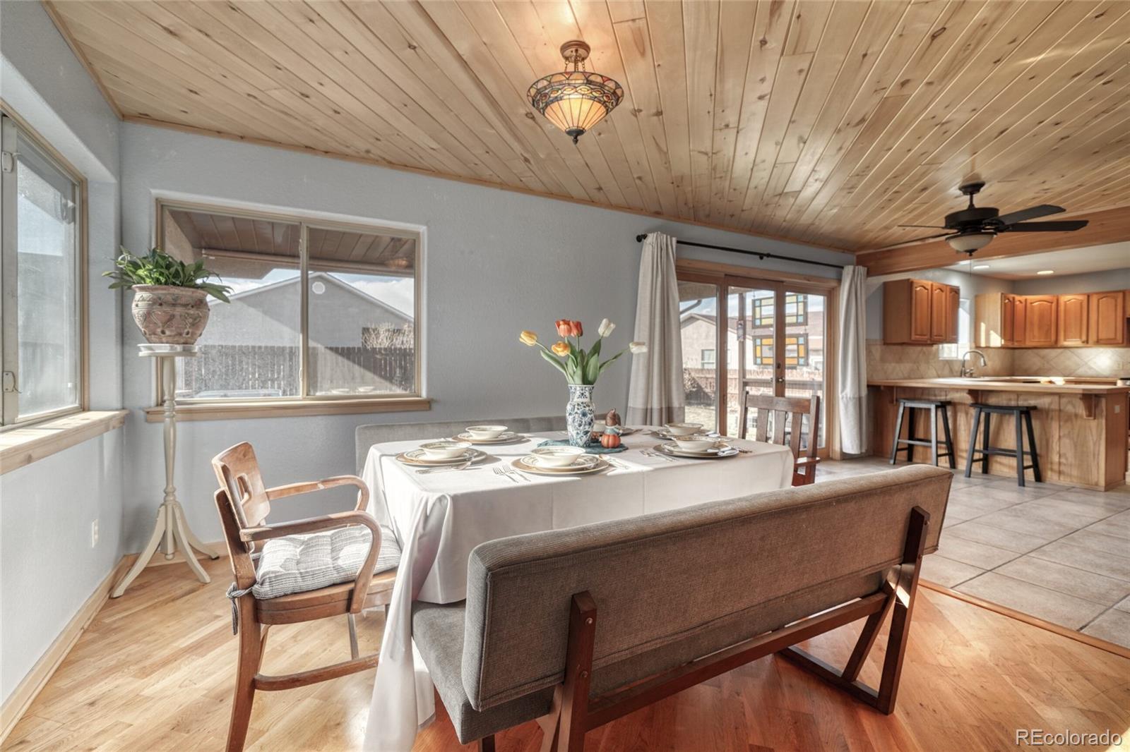 50 Rex Circle Salida, CO 81201 - Photo 27 of 50 a dining room with a wooden table and chairs