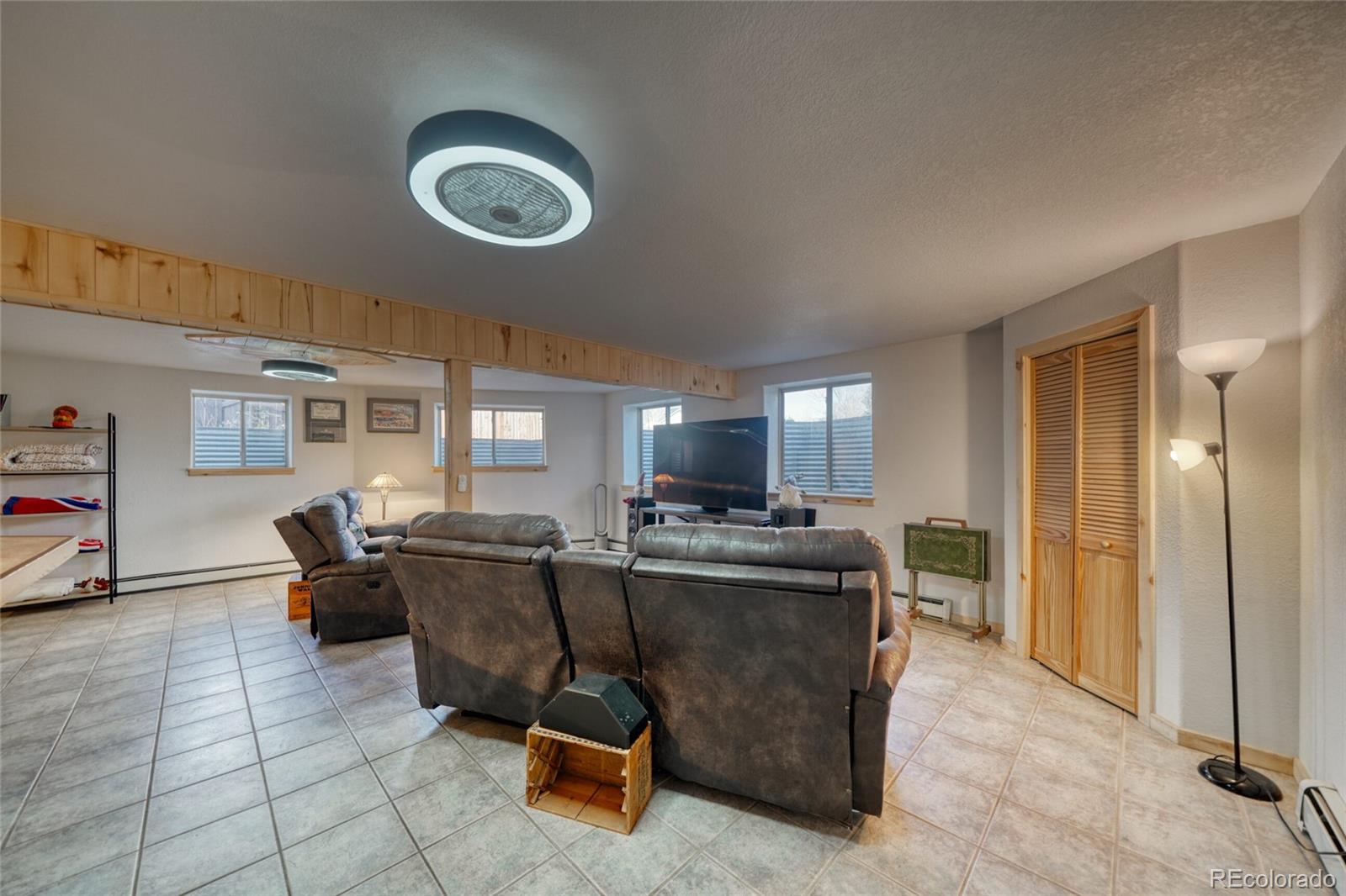 50 Rex Circle Salida, CO 81201 - Photo 38 of 50 a view of a dining room with furniture a chandelier and window