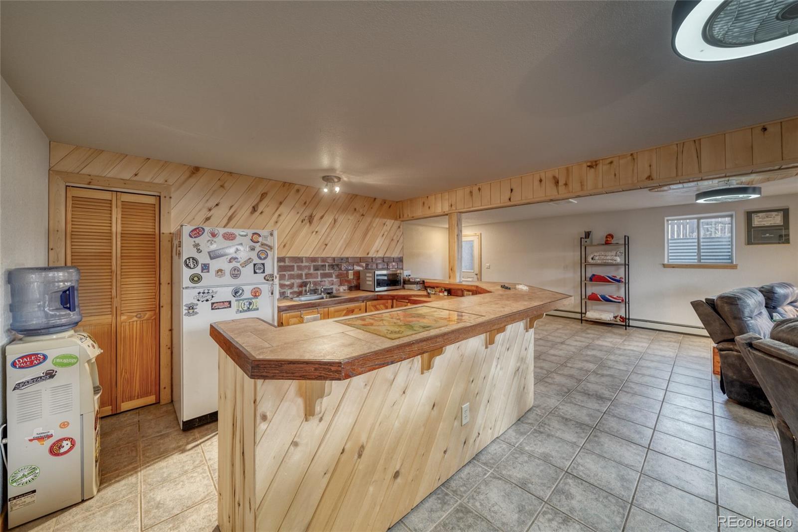 50 Rex Circle Salida, CO 81201 - Photo 41 of 50 a kitchen with stainless steel appliances granite countertop a sink and cabinets