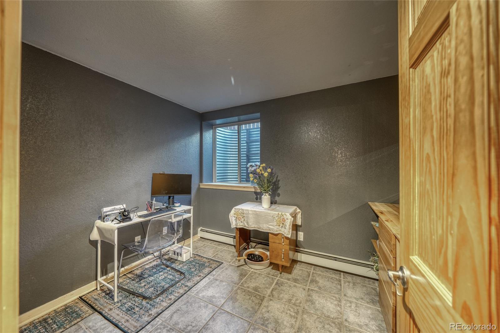 50 Rex Circle Salida, CO 81201 - Photo 43 of 50 a workspace with furniture and a window