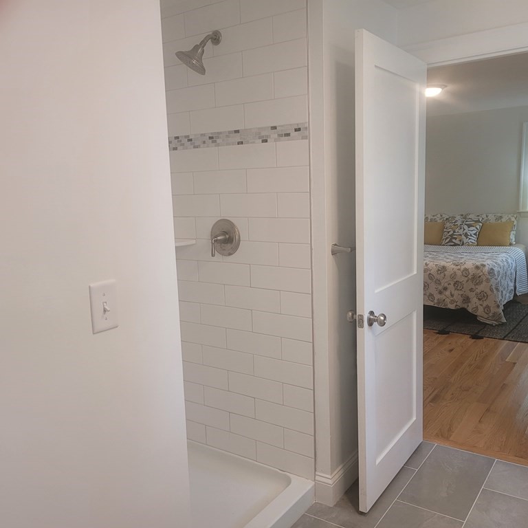 54 Summer Street North Andover, MA 01845 - Photo 20 of 25 a bathroom with a tub