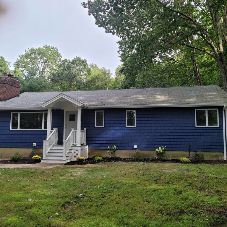 54 Summer Street North Andover, MA 01845 - Photo 2 of 25 a view of a house with a yard