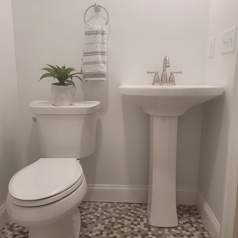 54 Summer Street North Andover, MA 01845 - Photo 24 of 25 a bathroom with a sink a toilet and shower