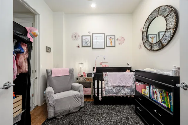 a kitchen with stainless steel appliances a refrigerator sink and microwave