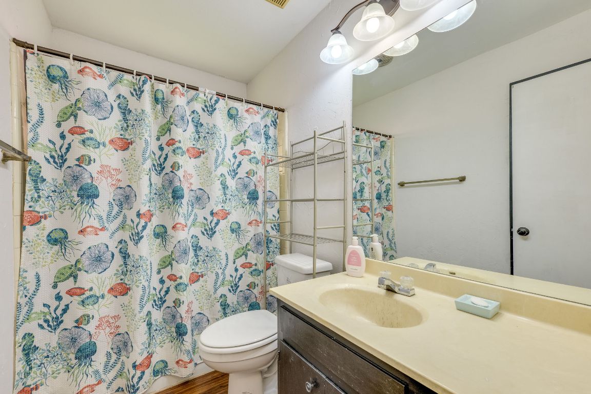 16041 Stoneham Circle Pflugerville, TX 78660 - Photo 15 of 34 a bathroom with a sink toilet and shower