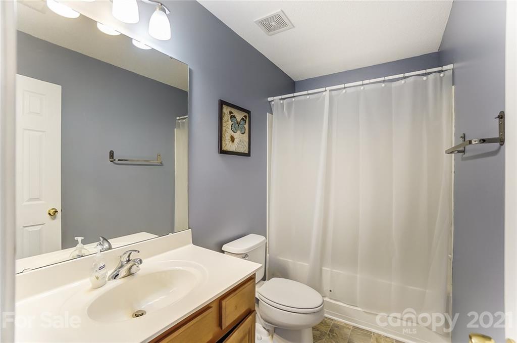 1545 Maypine Commons Way Rock Hill, SC 29732 - Photo 18 of 26 a bathroom with a sink mirror vanity and toilet