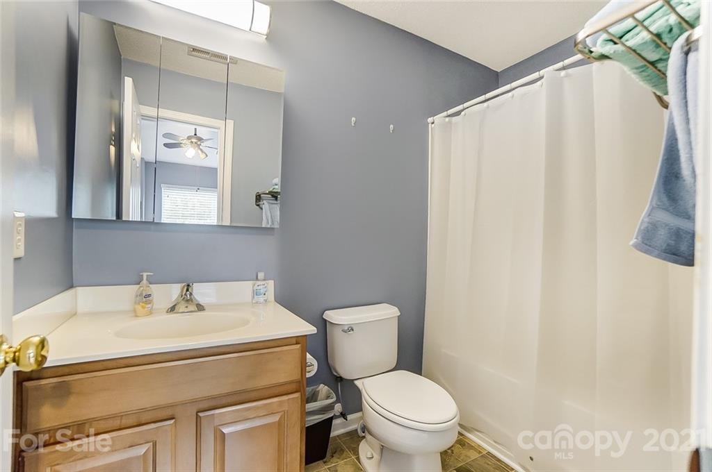 1545 Maypine Commons Way Rock Hill, SC 29732 - Photo 21 of 26 a bathroom with a sink toilet and vanity