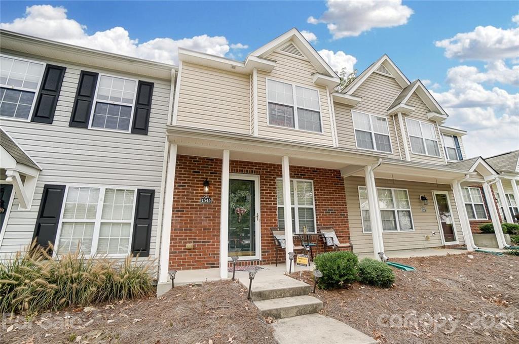 1545 Maypine Commons Way Rock Hill, SC 29732 - Photo 3 of 26 a view of a brick house with many windows
