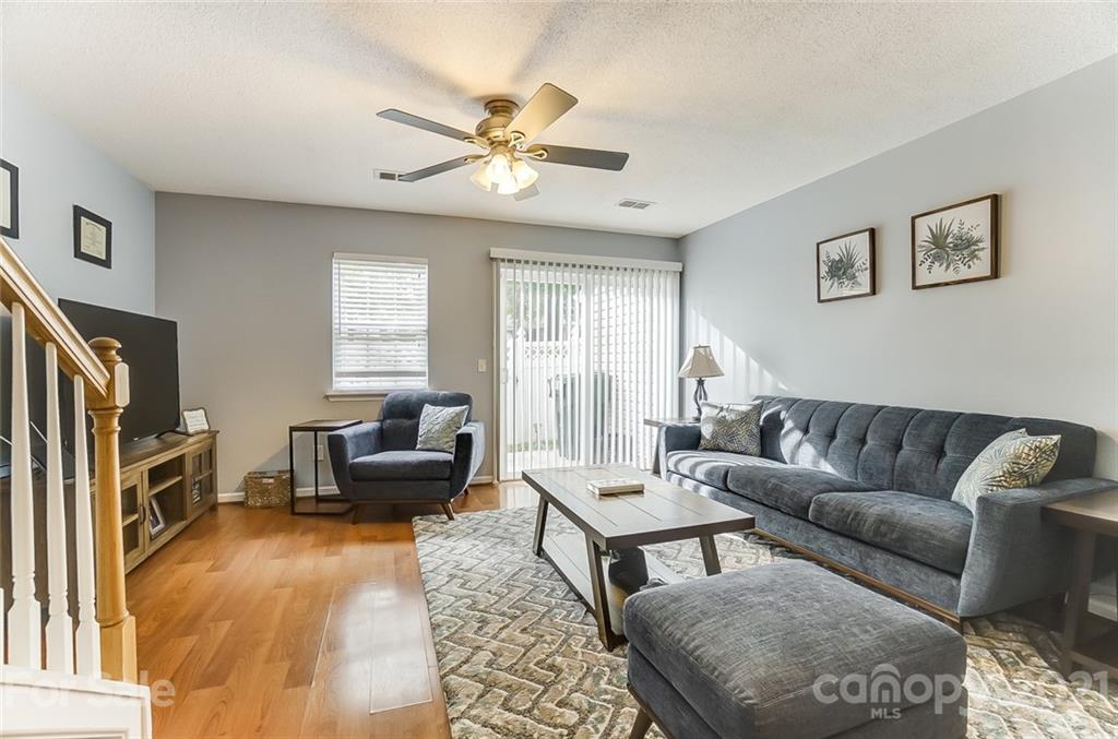 1545 Maypine Commons Way Rock Hill, SC 29732 - Photo 10 of 26 a living room with furniture and a fireplace