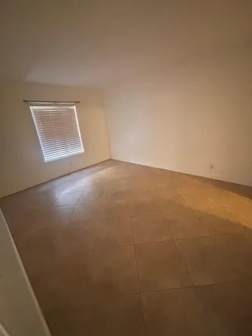 a view of a room with an empty space