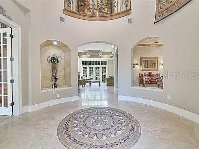 234 Acadia Terrace Celebration, FL 34747 - Photo 6 of 38 wooden floor with a rug