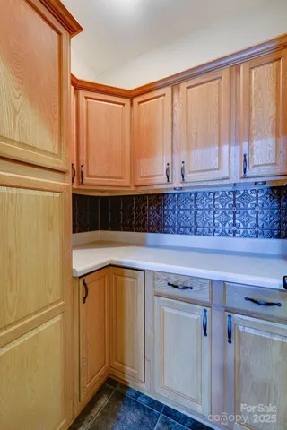 a view of a kitchen with electric appliances