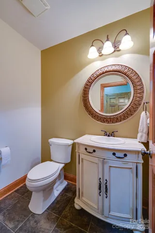 a bathroom with a toilet and a sink
