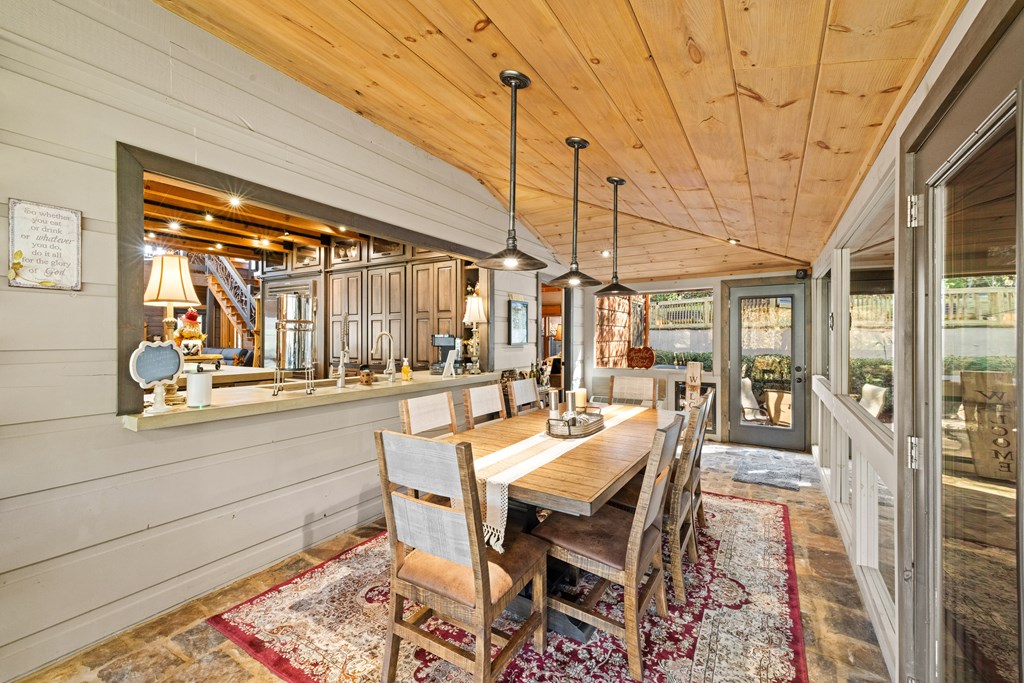 60 Ford Road Dahlonega, GA 30533 - Photo 11 of 59 a dining room with a wooden table and chairs