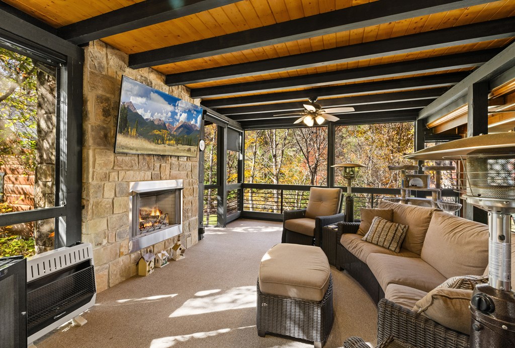 60 Ford Road Dahlonega, GA 30533 - Photo 21 of 59 a living room with furniture and a fireplace